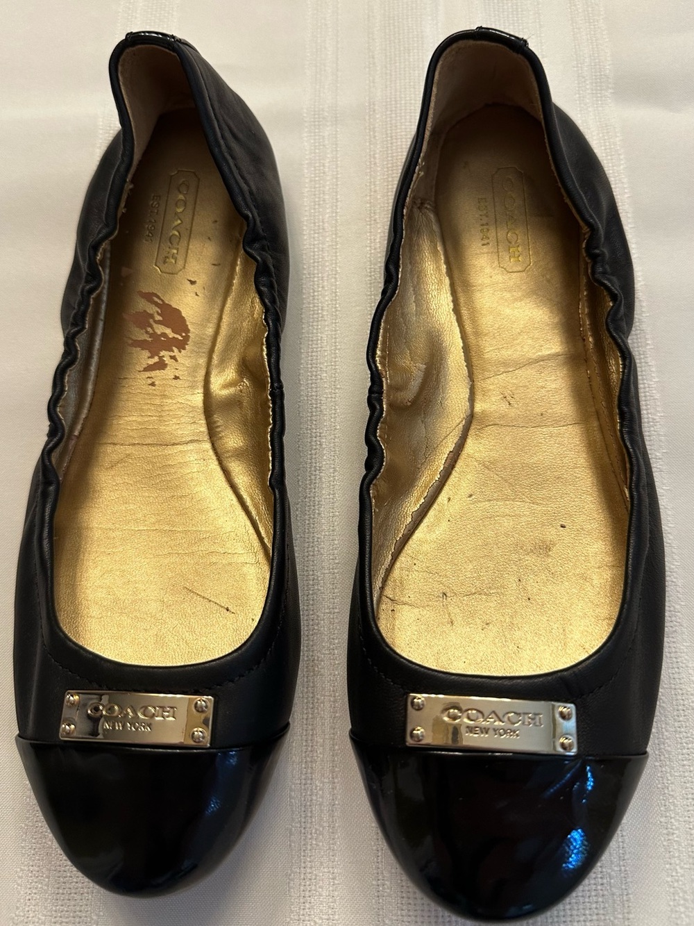 Coach Black Leather Ballet Flats with Gold Interior and Plaque